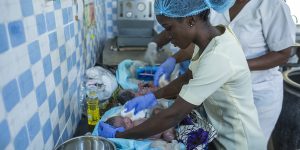 Nurses clean twin babies minutes after their delivery in Adeoyo maternity hospital, Ibadan.