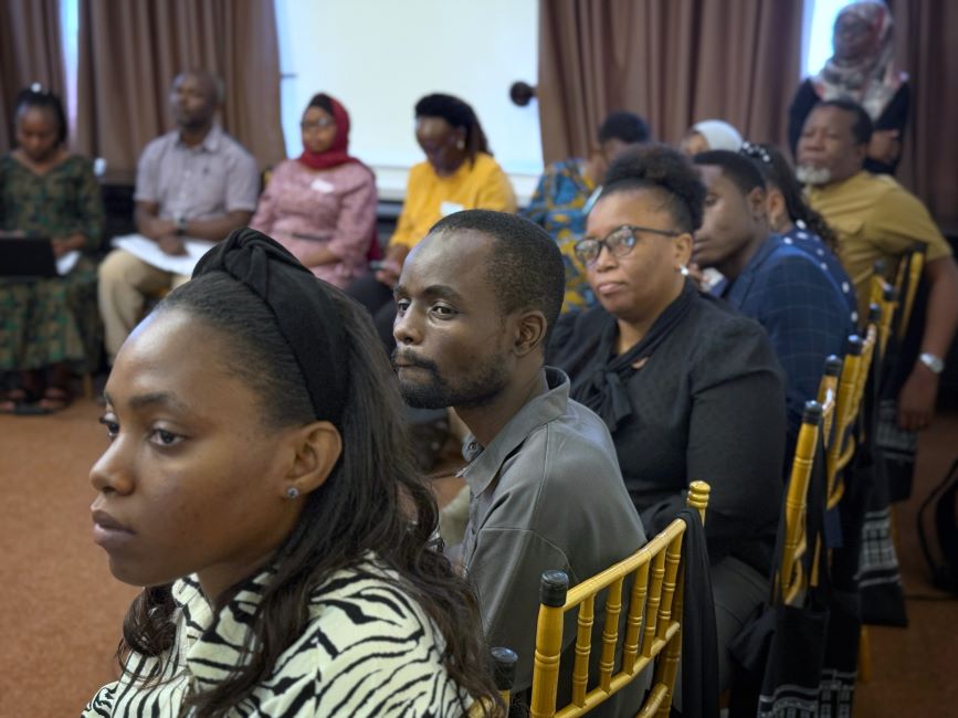 Clinicians who are part of the I’M WOMAN Trial meet in Tanzania to exchange knowledge and best trial practices.